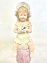 Bisque figure of young girl Height 31 cm