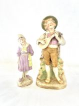 Two bisque figures Height 34 cm