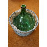 Antique French hand blown Demijohn in green glass