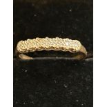 9ct Gold ring set with 7 diamonds Size O 1.4g