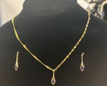 9ct Gold chain & pendant, pendant set with amethys