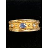 9ct Gold ring set with central sapphire & 2 diamon