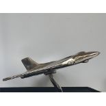 Large chrome vulcan bomber on stand