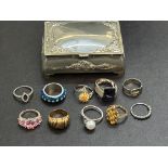 11 Silver rings in small jewellery box