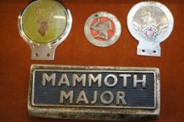 Collection of vintage car badge mascots
