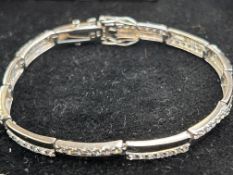 Silver bracelet set with 77 gem stones Wei