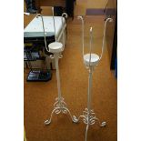 Pair of large metal candle sticks