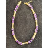 9ct Gold bracelet set with 24 amethyst Weight 5.8g