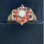 9ct Gold ring set with garnets cluster & central o