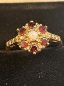 9ct Gold ring set with garnet & seed pearl Size Q