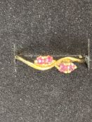 9ct gold ring set with 4 rubies, size M
