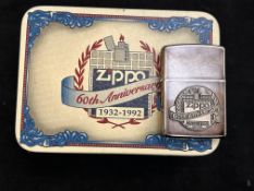 A Zippo lighter and presentation case