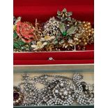 A collection of costume jewellery, pin brooches an
