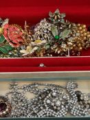 A collection of costume jewellery, pin brooches an