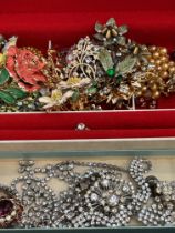 A collection of costume jewellery, pin brooches an