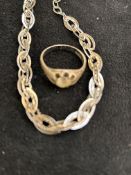 Silver bracelet together with a silver ring