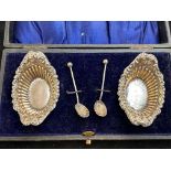 A cased pair of silver salts and spoons