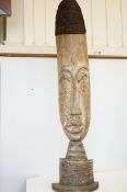 A large African freestanding carving, 105cm