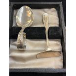 Silver baby spoon and food pusher in original box