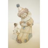Lladro baby clown with puppy