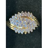 9ct Gold ring set with a cluster of blue stones We