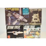 Four vintage model kits to include two Star Trek