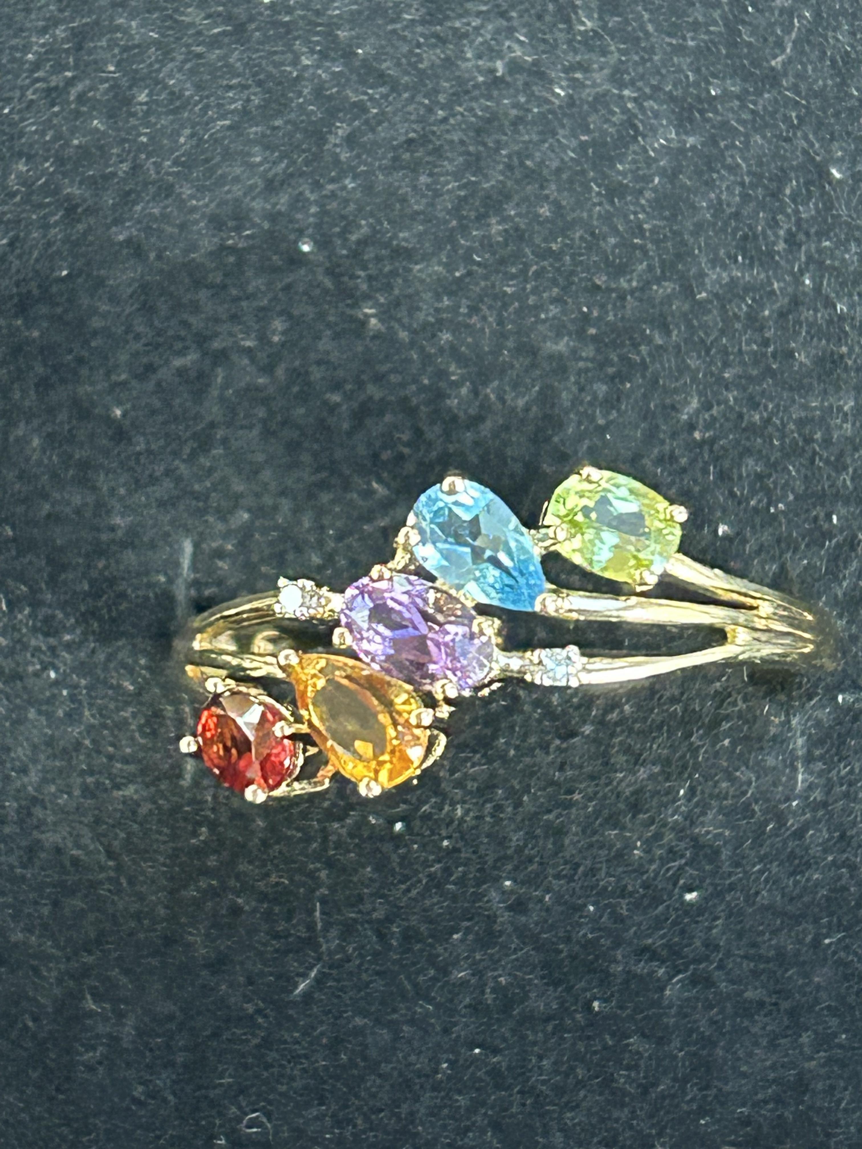 9ct Gold dress ring set with multi coloured stones