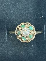 9ct Gold cluster ring set with emeralds surrounded