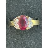 9ct gold dress ring set with large red stone Weigh