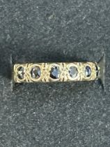 9ct Gold Half eternity ring set with 7 garnets Siz