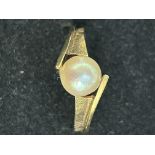 9ct Gold ring set with single pearl Size O.5