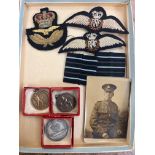 Military badges to include a photograph & 3 other