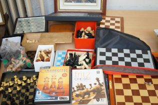 Good collection of chess sets and extra pieces