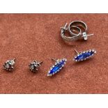 3 Pairs of silver earrings