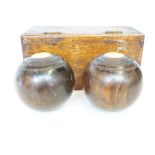 Pair of lignum bowls with box