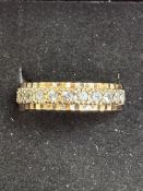 9ct gold full eternity ring set with white stones,