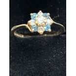 9ct Gold ring set with blue topaz & cz stones Size