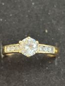 9ct gold ring set with white stones, size P.5