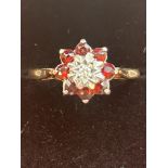 9ct Gold ring set with diamond & garnets Size O 2g