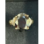 9ct gold very large dress ring set with large red