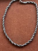 Silver heavy neck chain stamped on clasp