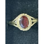 9ct Gold ring set with garnet Size O