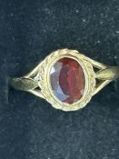9ct Gold ring set with garnet Size O