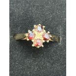 9ct Gold ring set with 4 garnets Size N