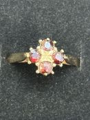 9ct Gold ring set with 4 garnets Size N