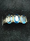 9ct Gold ring set with 3 large blue gem stones Wei