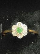 9ct Gold ring set with diamonds & central emerald