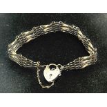 9ct gold gate bracelet with heart shaped locket an