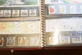 Full album of Mint stamp presentation packs, 52 in