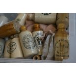 Large collection of stoneware bottles